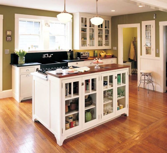Transparent doors could make a kitchen island cabinets looks less massive.