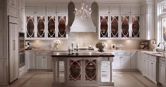 Use the same glass door design as your upper cabinets have for your kitchen island and it would fit your kitchen well.