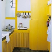 an yellow kitchen design for a modern home