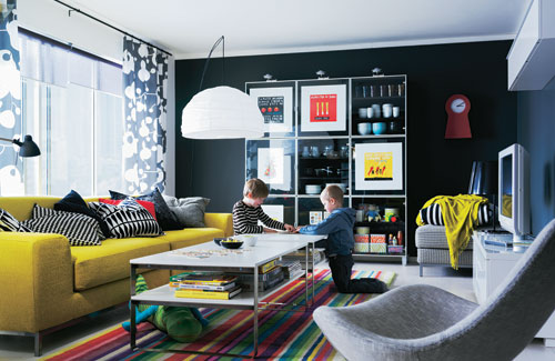 Living Room With Colorful Furniture And Black Walls