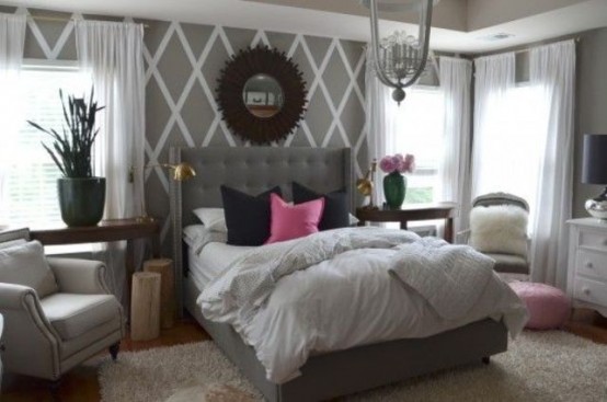 a grey, white and black bedroom spruced up with hot pink touches looks glam, chic and much more welcoming than before