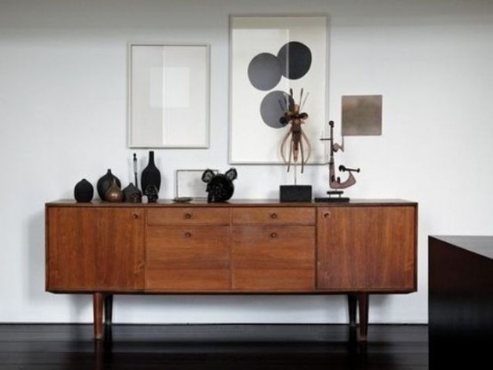 a stained credenza with drawers and tall legs is a cool idea for a mid-century modern or Scandinavian space with a touch of chic