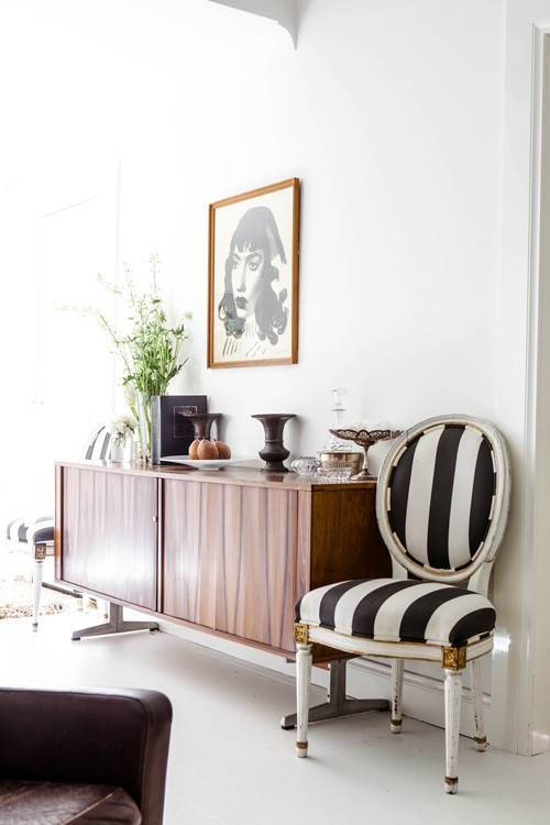 a beautiful and elegant mid-century modern credenza on tall legs is a cool idea for a mid-century modern or Scandinavian space