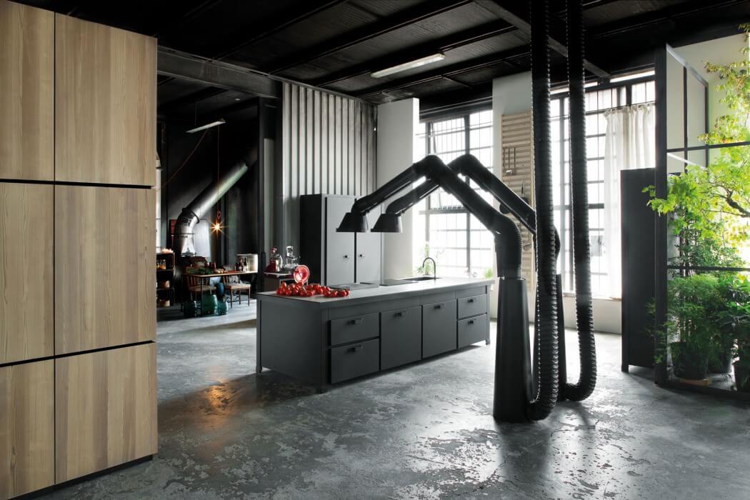 Milan industrial loft with dark industrial metals in decor  2