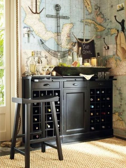 an elegant vintage bar of dark wood with open and closed storage compartments and a bar stool for a vintage feel