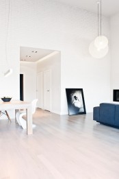 Minimalist Black And White House With Oak Floors And Furniture