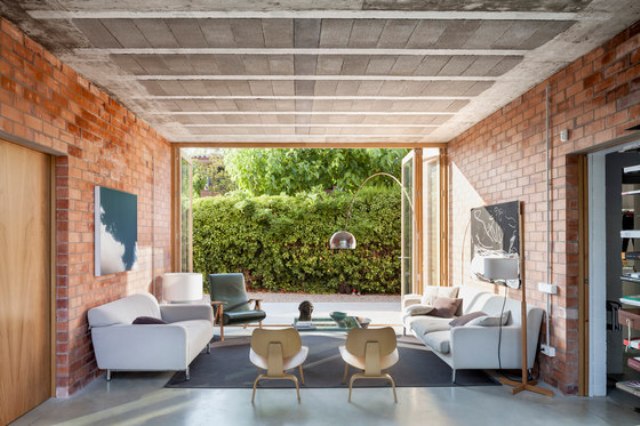 Modenr brick home that merges with the garden  15