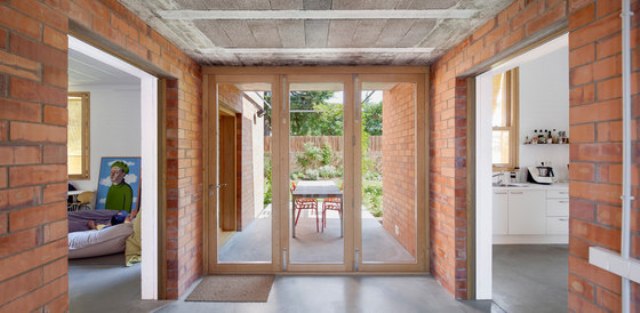 Modenr brick home that merges with the garden  7
