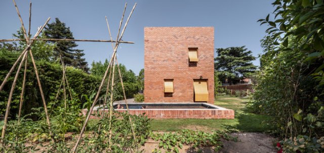 Modenr brick home that merges with the garden  9