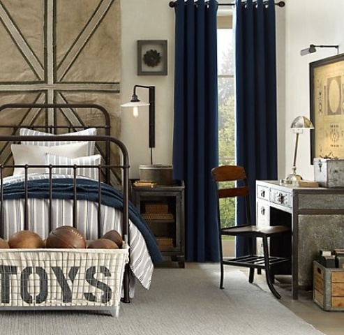 This cozy and inviting boy's room features some awesome industrial-style vintage-looking decorations that make it looks quite stylish.