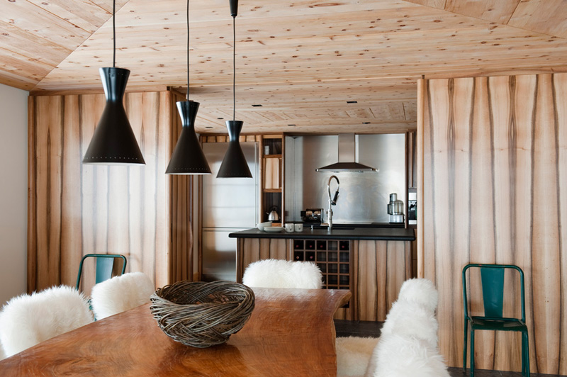 Modern chalet with wood clad interiors and touches of green  5