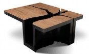 a creative wooden coffee table with a large crak in the tabletop showing the imperfection of nature