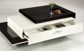 a modern storage coffee table with dark-stained and white compartments for storage and a small tabletop is ideal for small spaces