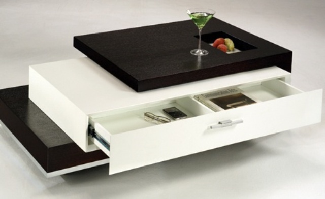 A modern storage coffee table with dark stained and white compartments for storage and a small tabletop is ideal for small spaces