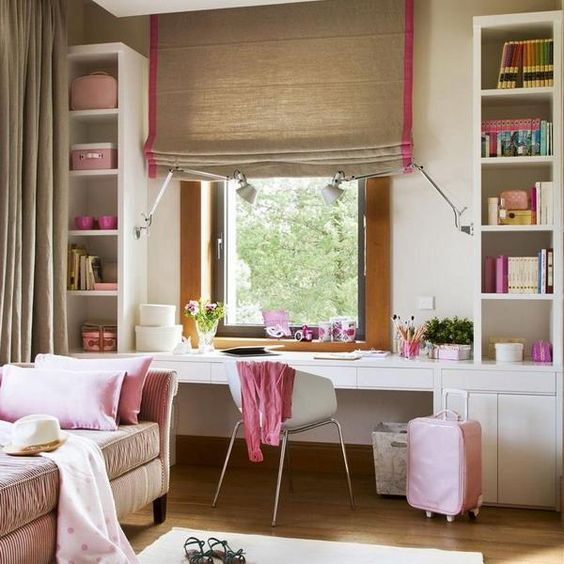 a neutral teen girl bedroom with pink touches that make it look more girlish and fun and very welcoming