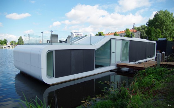 Modern Houseboat In The Amstel River of Amsterdam
