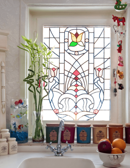 colorful stained glass window is private and bold, it keeps privacy giving a slight vintage feel to the space