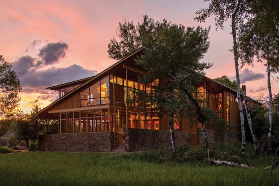Montana Glass Home With Lots Of Natural Wood In Decor