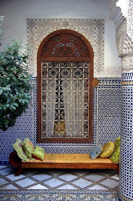 A fantastic riad clad with gorgeous Moroccan tiles, different on the walls, floor and over the window looks jaw dropping