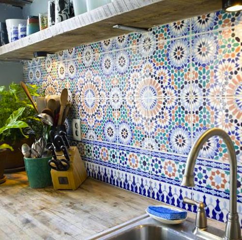 A super bright Moroccan tile backsplash like this one will add interest and eye catchiness to any space, even the most neutral one