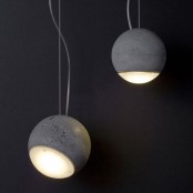 concrete sphere pendant lamps with bulbs are amazing for an industrial or mid-century modern space