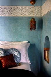 a hanging bed lantern, beautiful pattern on the wall for a Moroccan feel