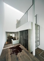 Narrow Urban House With Industrial Minimalist Interiors