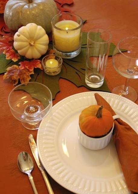 pumpkins, leaves and candles are all you need for a lovely Thanksgiving tablescape with a strong natural feel