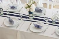 navy-inspired table setting  for a boy baby shower