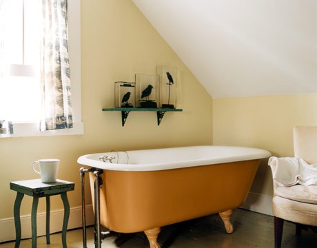 A rust colored bathtub will accent your neutral space and add color to it, which means adding interest to the space, too