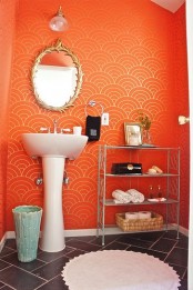 brighten up your bathroom with orange printed wallpaper – wallpaper in bathrooms is a very hot trend