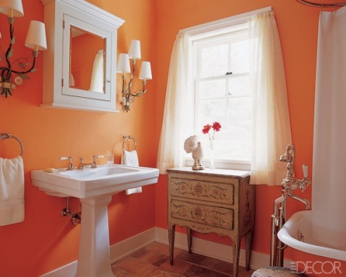 a romantic orange and white bathroom in vintage style looks fresh, vivacious, warm and very inviting