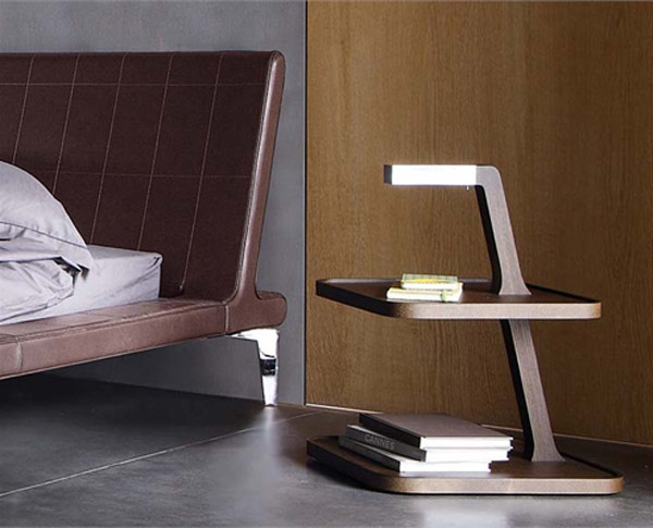 A chic dark stained tiered nightstand is a lovely idea for a modern bedroom, it may add interest to the space