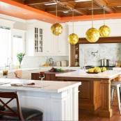 gorgeous gold faceted sphere pendant lamps on chain are amazing to add a touch of glam to the space and will make it more eye-catchy