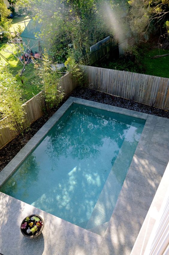 outdoor plunge pool with a stone deck