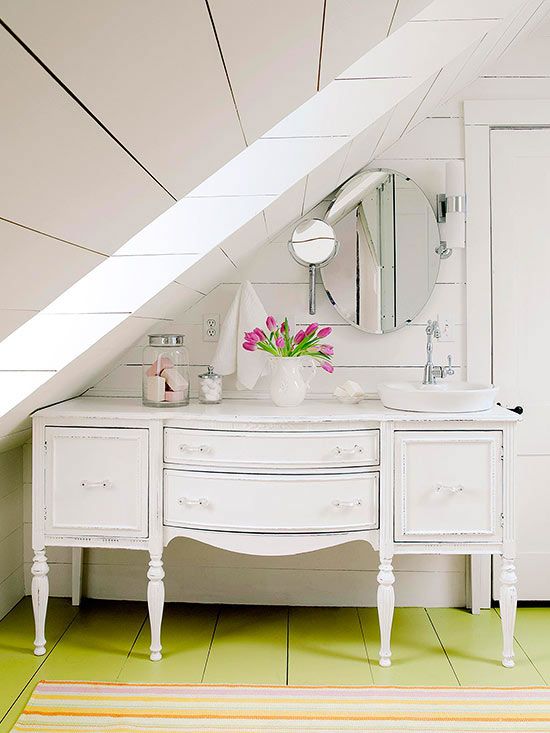 a vintage dresser turned into a whitewashed vanity will add a refined touch to the space