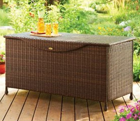 A wicker bench and chest in one is a timeless way to get storage and bring an relaxed feel at once