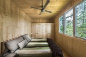 Prefab Lake Cottage With Unfinished Wooden Walls