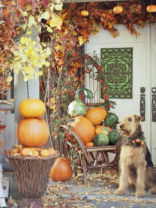 Arrange a pretty pumpkin centerpiece right on your porch' furniture.