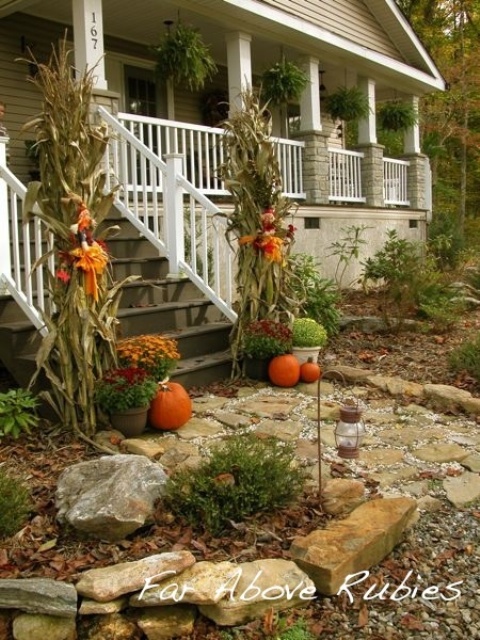 Tall corn stalks are definitely eye-catching as visitors approach the porch.