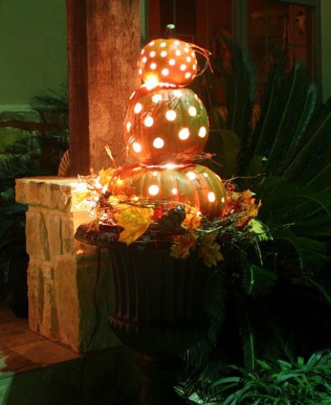 Pumpkins with lights inside works not only for Halloween but for overall Autumn's decor too.