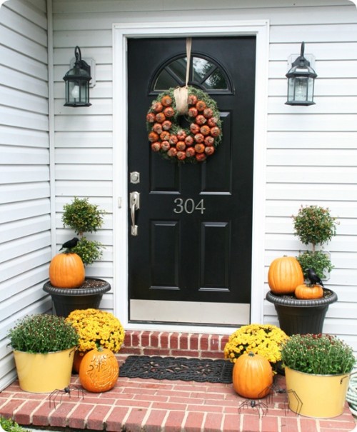 Make sure your decor is symmetrical on either side of the door for a more sophisticated look.