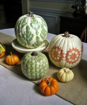 stenciled bright pumpkins are great for the fall, and such a DIY is very easy to make yourself