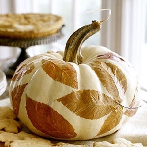 pumpkins with decoupaged fall laves are amazing for decorating your home for the fall