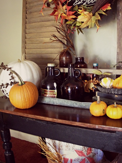 simply place natural pumpkins and gourds on tables and consoles to make your space look fall-infused and chic