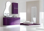 a purple and off-white bathroom with clean lines and shapes, a catchy shaped mirror and a floating vanity