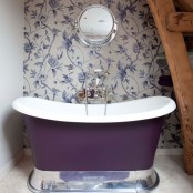 a cozy vintage bathroom design with a purple bathtub