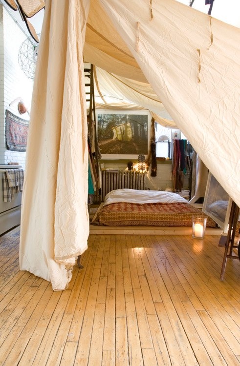 Nothing says boho like sleeping on a floor surrounded by a large canopy.