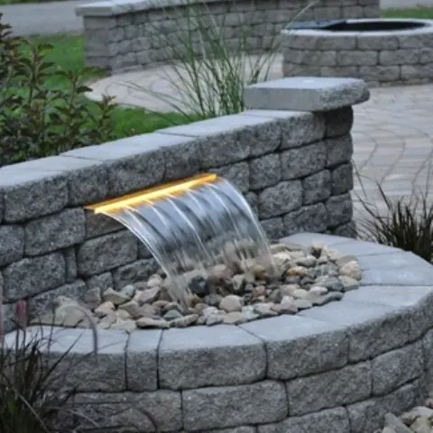 Contemporary waterfalls looks great too. Besides they could fit your backyard's landscape even better than natural ones.