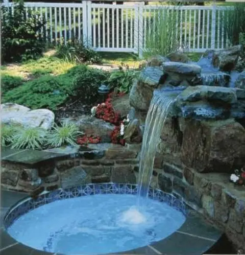 A waterfall is a great addition even to a small pool.